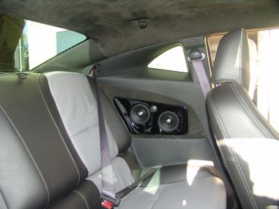 Rear seating area with TREO TSX Component speakers and suede headliner