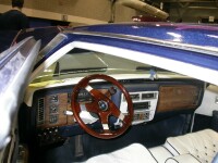 Custom Nardi woodgrain steering wheel and shifter and custom-upholstered leather seats