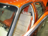 Custom orange and white leather seats with 