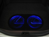 Custom TREO SSi12 enclosure with custom Lexus logo subwoofer grilles illuminated in blue