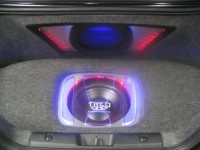 TREO SSi12 subwoofer in custom fiberglass enclosure with amplifier ventilation grille