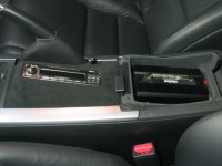 Custom-mounted Clarion Pro Audio source unit with suede trim